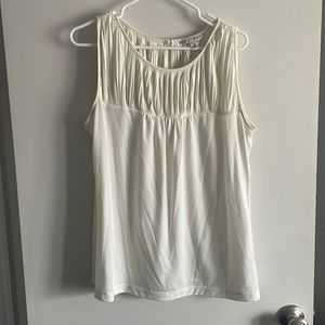 Cream sleeveless top with pleated detail